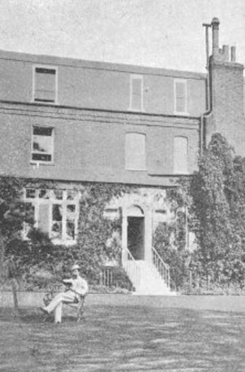 Charles Dickens Reading in Garden